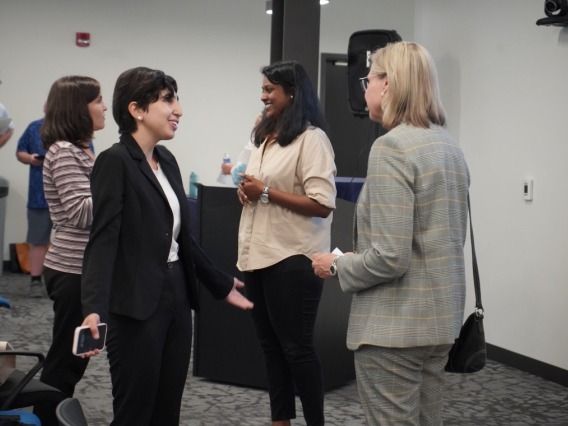 A student entrepreneur discusses her pitch with BIO5 Institute director Jennifer Barton at Student Startup Demo Day.