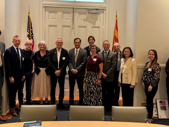 A delegation from CNRS poses for a picture with U of A leadership.