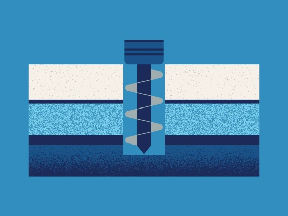 A graphic representation of a drill entering a several layers of earth