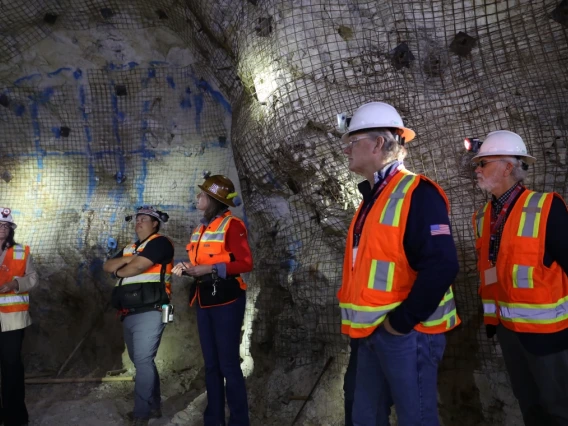 Kray Luxbacher and crowd at the San Xavier Underground Mining Laboratory