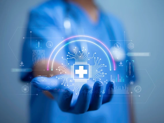 A healthcare professional holds out a hand with a glowing circuit board and medical cross icon, symbolizing AI-driven health technology and digital innovation in medicine.