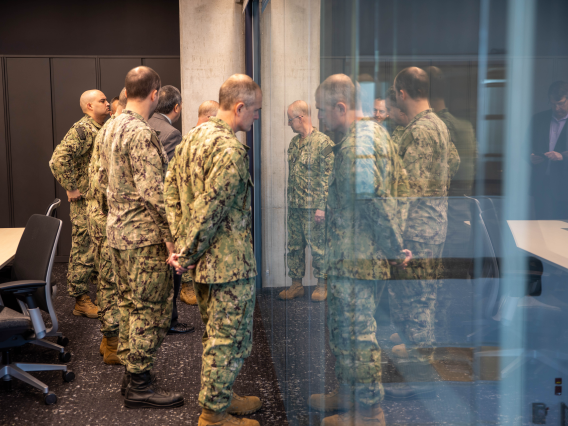 A delegation from U.S. Fleet Forces Command tours the Applied Research Building.