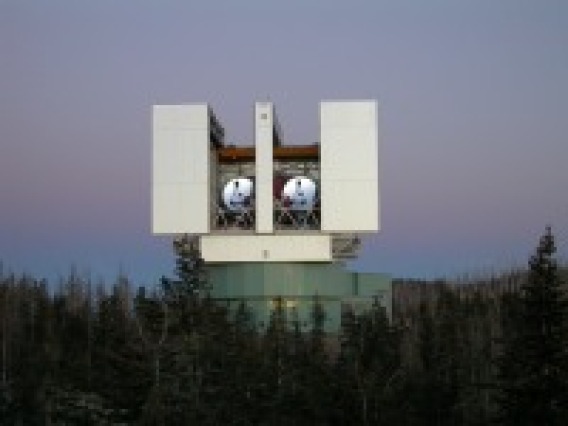 The two primary mirrors  are visible in this photo taken of the Large Binocular Telescope at dusk