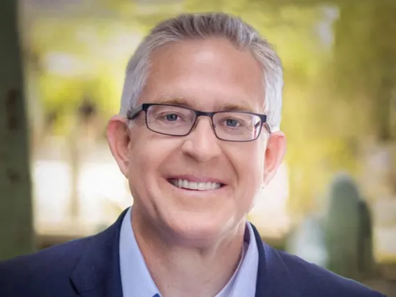 smiling man in business suit