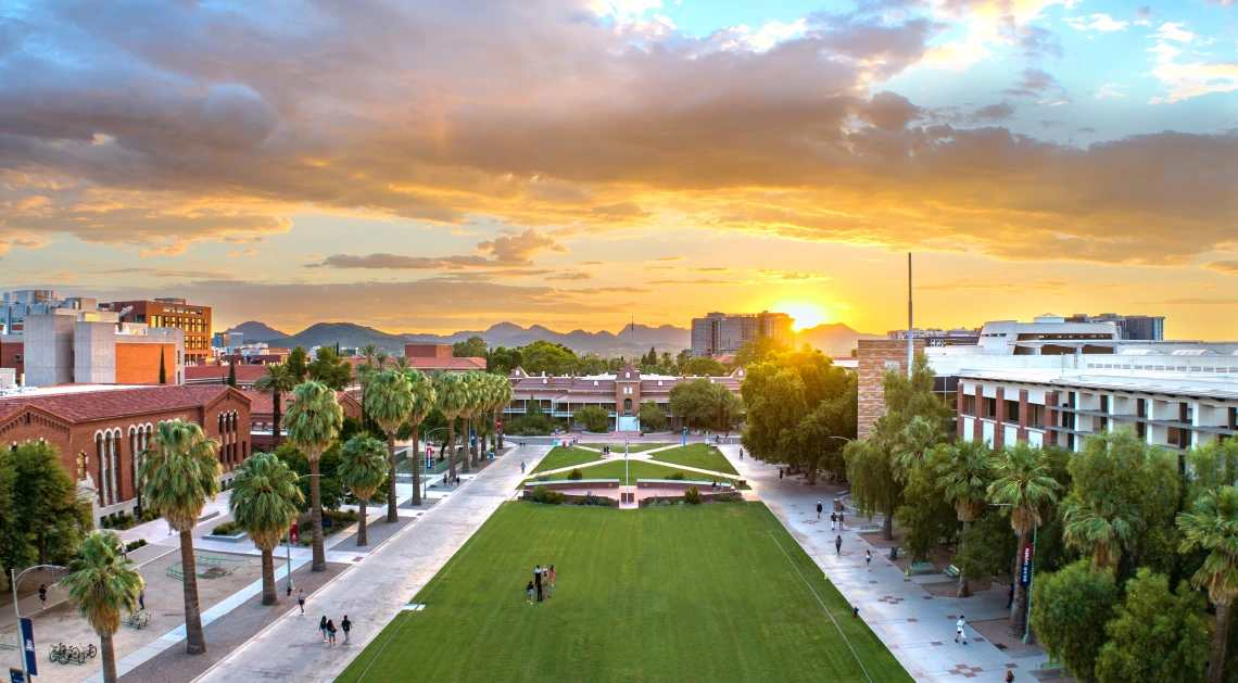 The U of A Campus mall and a cloudy sky at golden hour