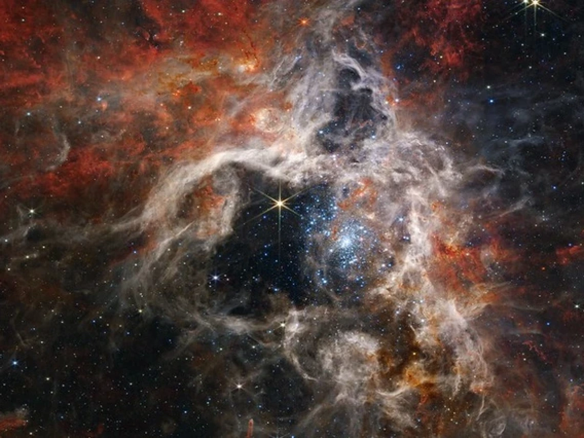 The James Webb Space Telescope reveals details of the structure and composition of the nebula as well as dozens of background galaxies.