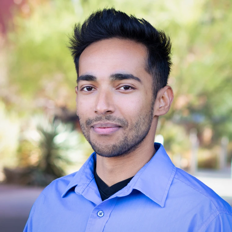 portrait photo of young man with short hair