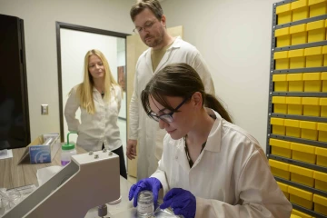 Scientists performing a lab test