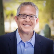 smiling man in business suit