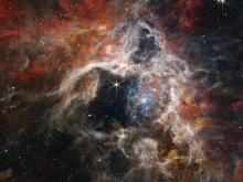 The James Webb Space Telescope reveals details of the structure and composition of the nebula as well as dozens of background galaxies.