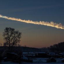 a trail of clouds in the sky created by a meteorite falling to Earth