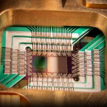 Close-up photo of a quantum computing processor chip