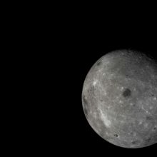 The far side of the moon, with distant Earth in the background, is visible in this photo taken by the Chang&#039;e 5-T1 mission. 