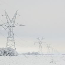 Transmission towers and lines covered in snow in East Texas