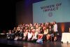 2022 Women of Impact awards pose for a photo with the inaugural Young Women of Impact cohort.