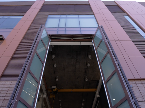 The tall front doors of the University of Arizona's Applied Research Building