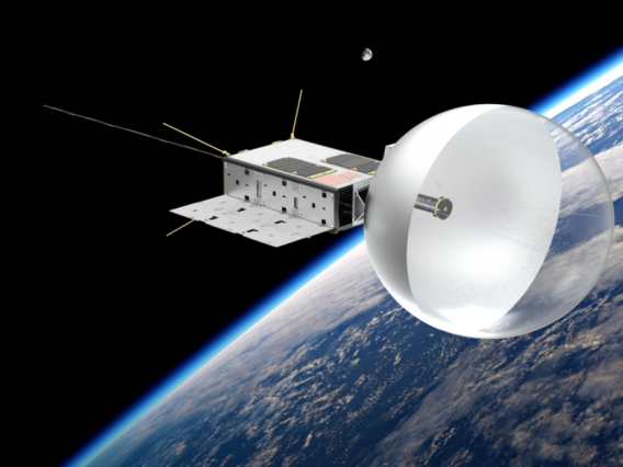 Artist's rendering of CatSat in Earth orbit, with its inflatable, beachball-like antenna deployed.