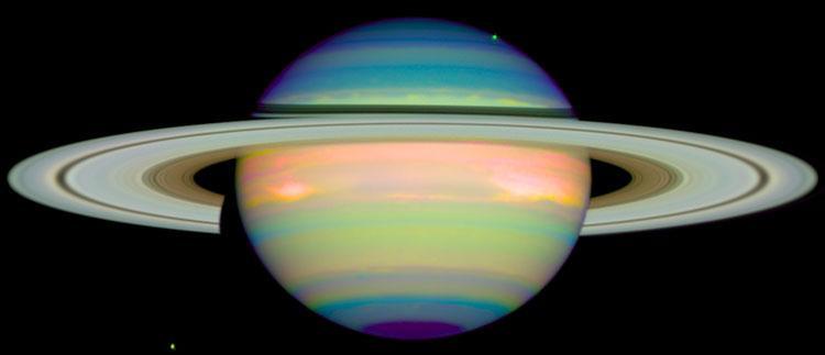 An infrared image of Saturn, the gas giant planet, taken using the Hubble space telescope for research done by the University of Arizona