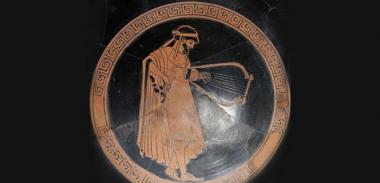 Greek Pottery of a musician playing the lyre